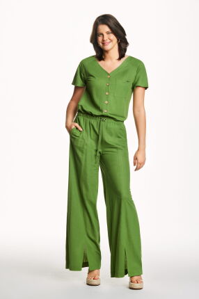 Zielone spodnie z rozporkami na nogawkach